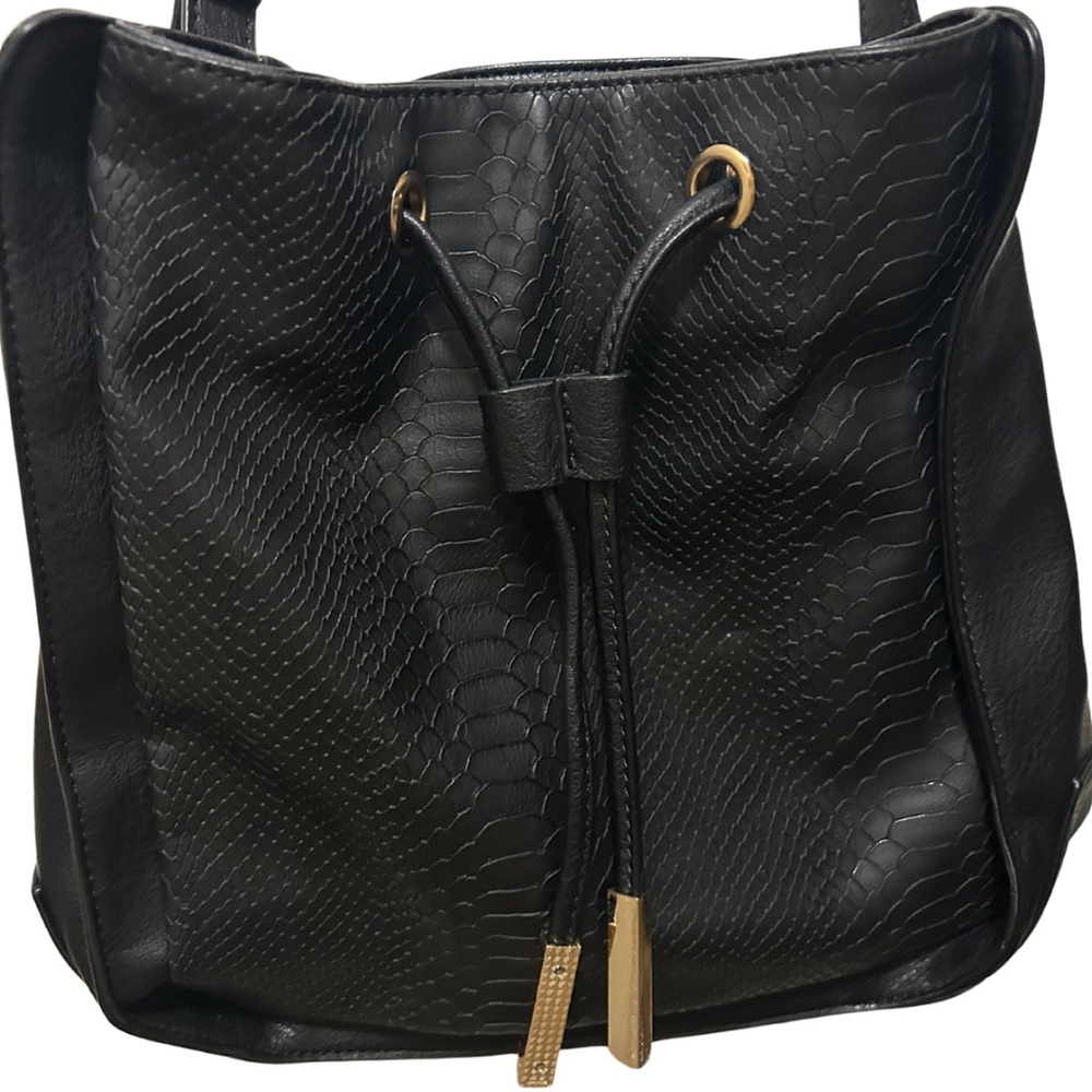 Melie Bianco vegan black faux leather “snakeskin” drawstring bag. 11x10x5.